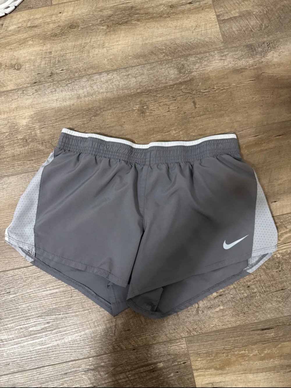 Nike Women's Gray Athletic Running Shorts with White Swoosh